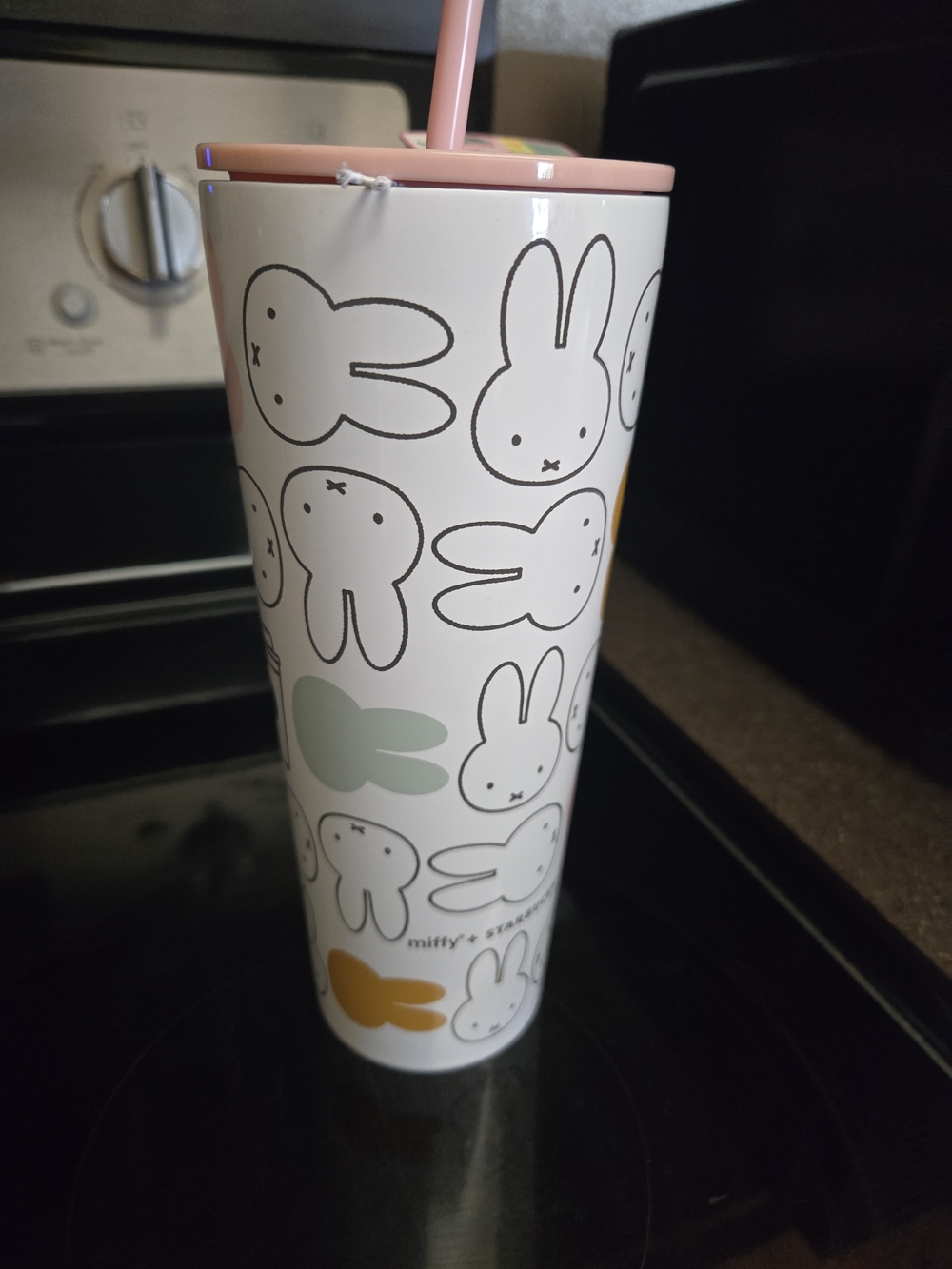 Starbucks White Tumbler with Pink Lid and Multicolor Bunny Design
